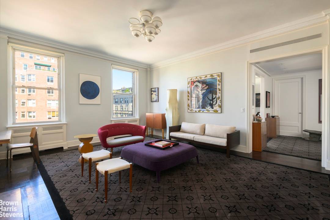 Perched high above Park Avenue at the apex of Carnegie Hill, this sophisticated 10 into 9 room prewar gem, elegantly rethought, offers gracious living on the Upper East Side.