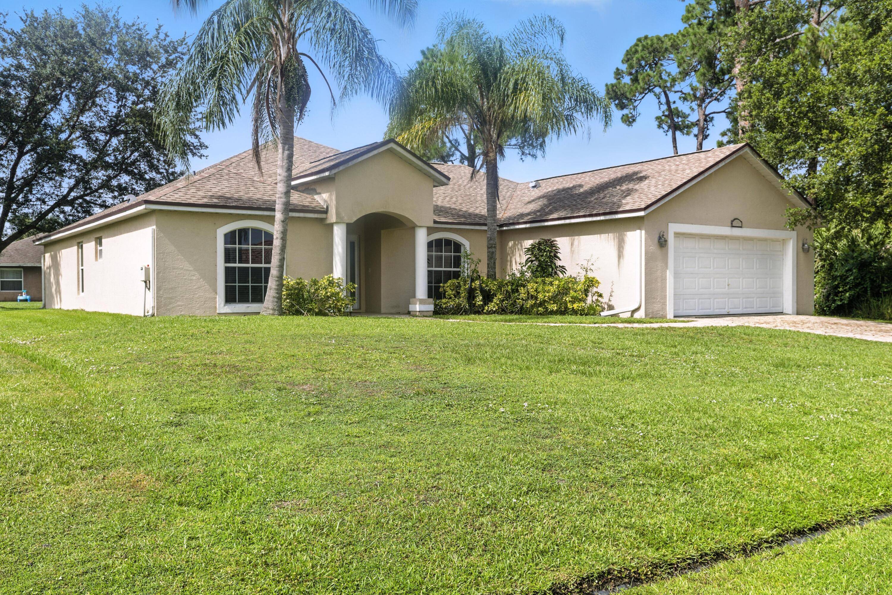 SPACIOUS 4 BR HOME WITH IN LAW SUITE AND NEW ROOF !
