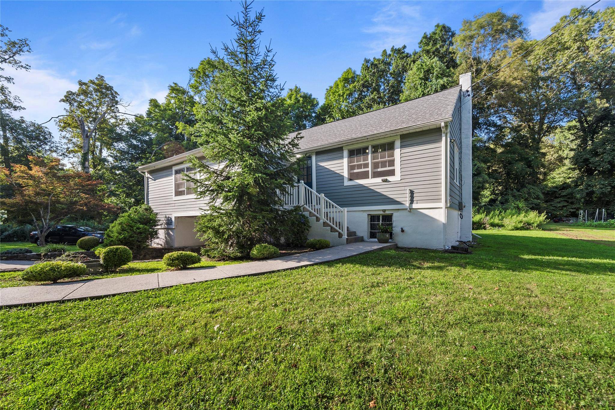 Welcome to this charming and beautifully maintained 3 bedroom, 2 bath ranch nestled on a generous.