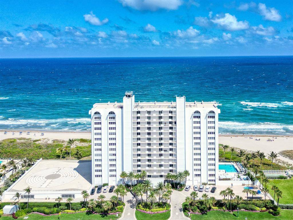 Discover your perfect beach retreat in this beautifully updated 1st floor walk out unit, offering unparalleled ocean views and ultimate privacy.