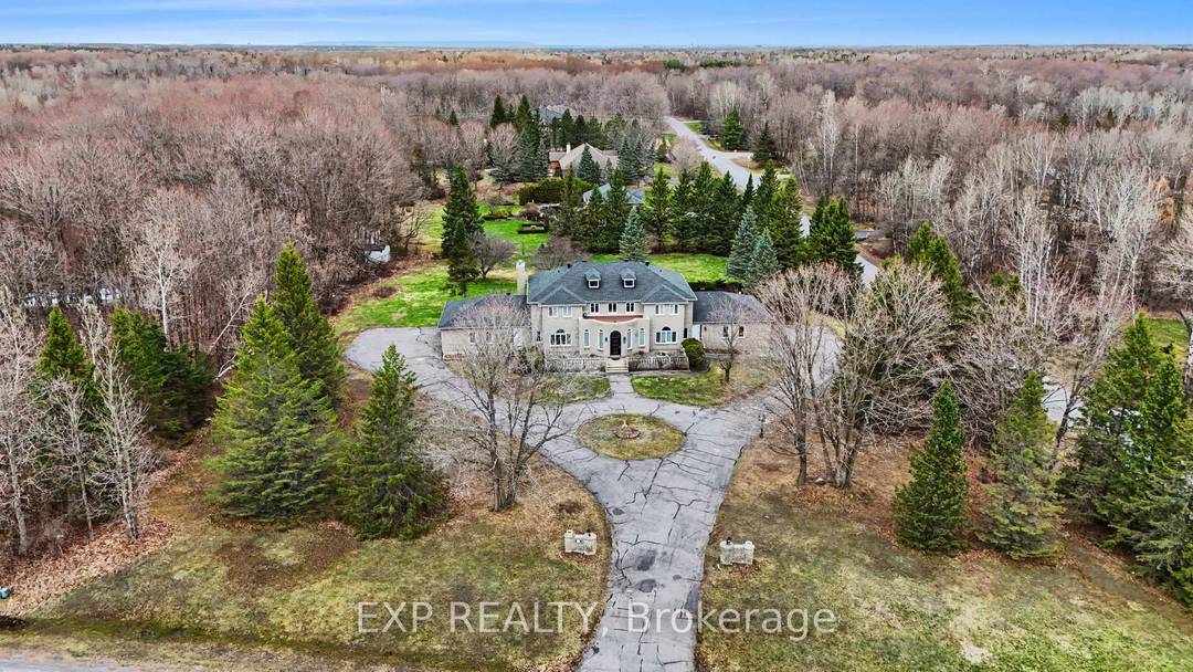 Welcome to your private estate in the heart of Rideau Forest, set on approximately 2 acres surrounded by mature trees and manicured grounds.