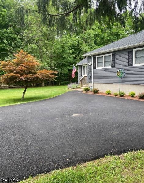 Beautifully maintained ranch style home set on a generous lot in sought after Parsippany Troy Hills.