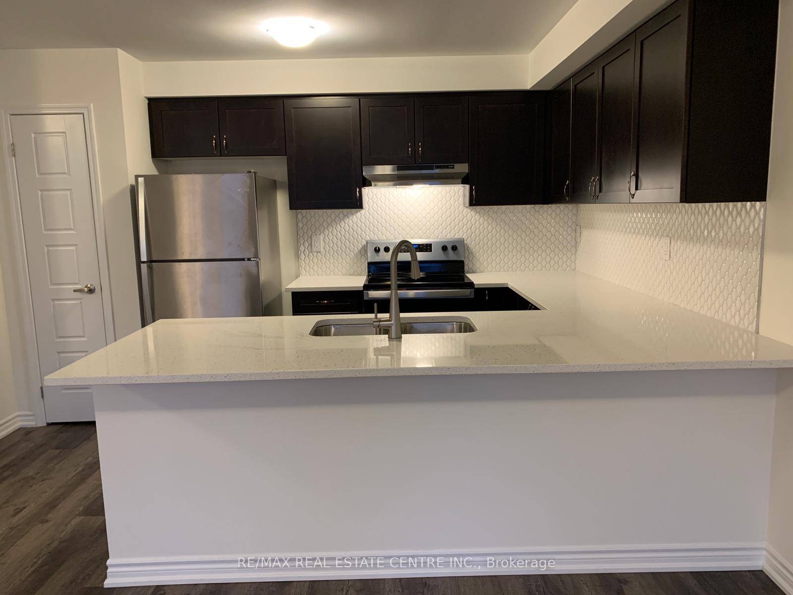 Welcome to this beautifully maintained Mattamy built freehold townhome in a prime Milton location !