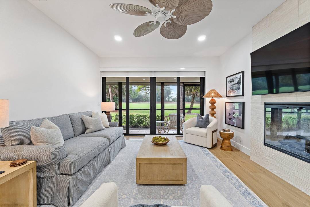 Fabulous and highly sought after one level end unit patio home in the prestigious PGA National Resort.