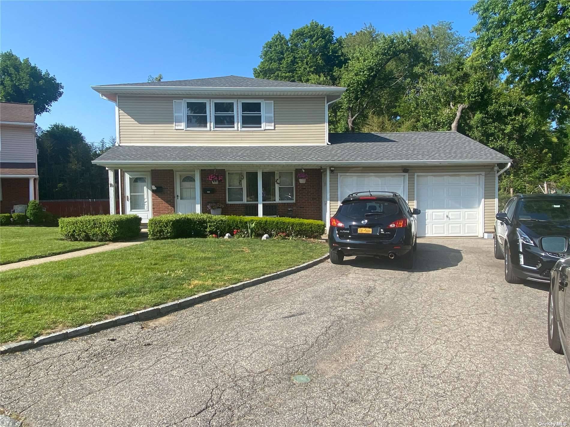 This Three Bedroom One Bath Apartment is located on the second floor of a two family home.