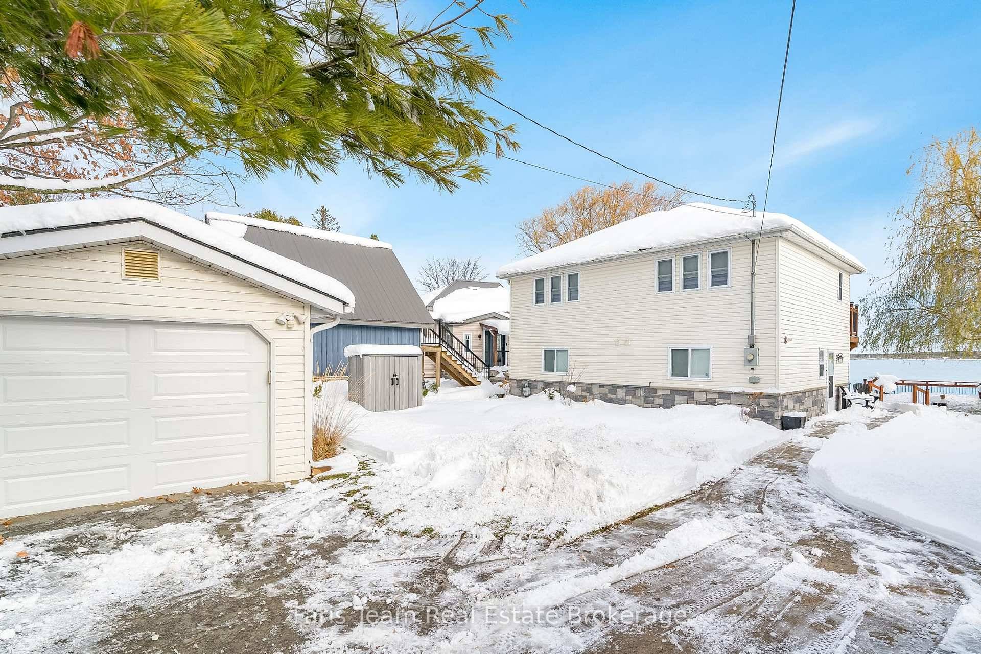 Top 5 Reasons You Will Love This Home 1 This waterfront home showcases breathtaking panoramic water views, creating a tranquil and scenic atmosphere enjoyed from multiple rooms throughout the house ...