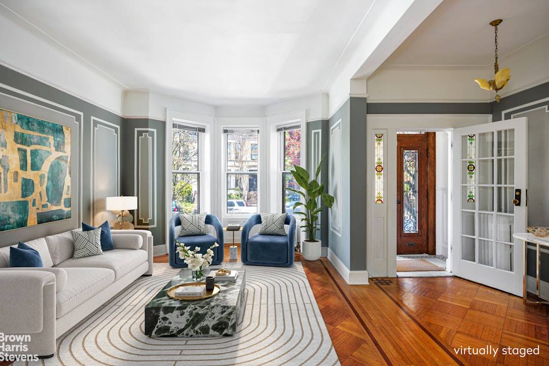 Beautifully renovated, but retaining its lovely period detail, this bay windowed, one family brownstone is located on one of historic Prospect Lefferts Garden's prettiest, tree lined blocks.