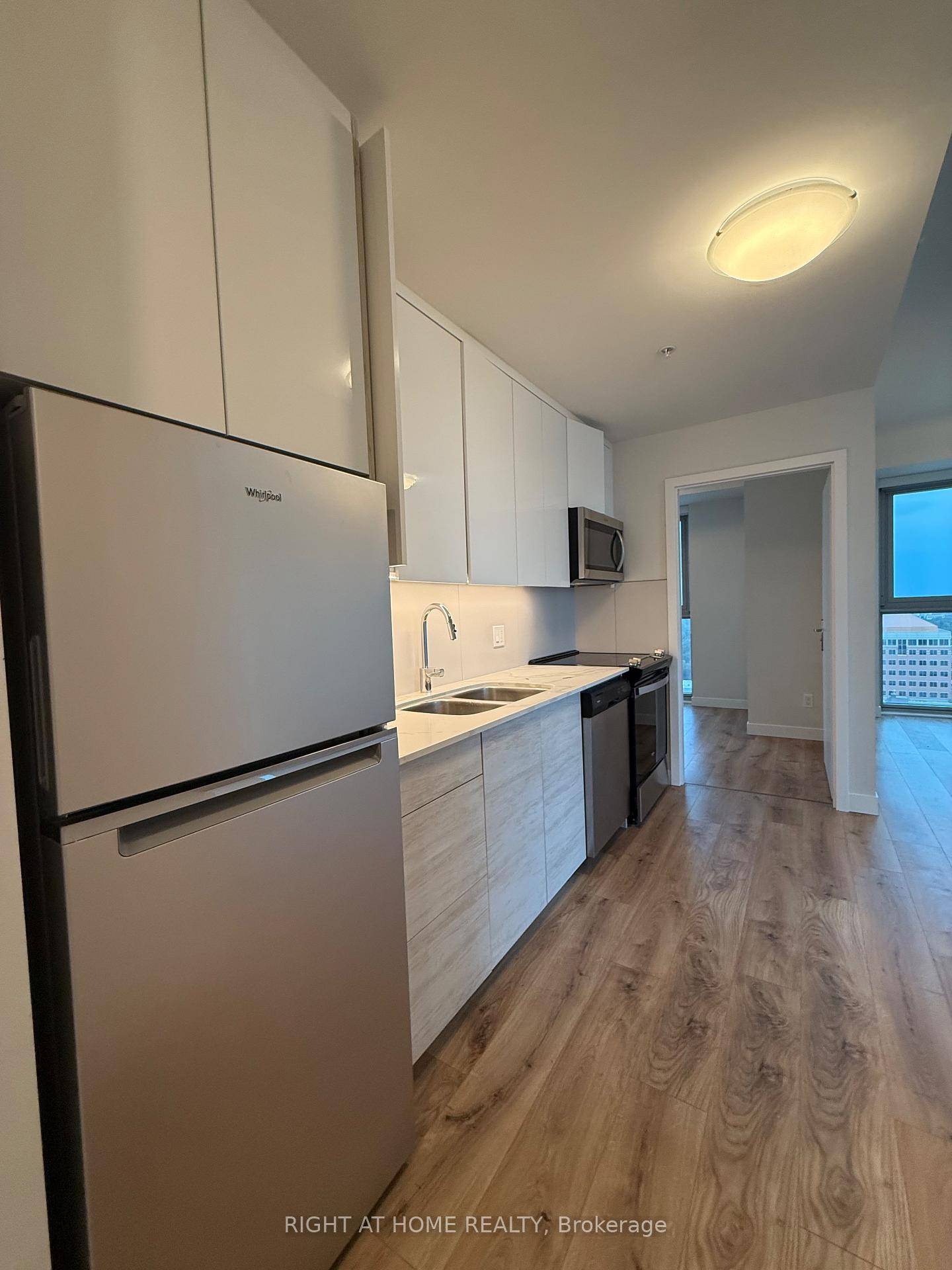 Welcome to DTK Condos, featuring a bright and spacious 2 bedroom, 2 bathroom 694 sq ft unit with one parking spot included, a modern open concept layout, floor to ceiling ...
