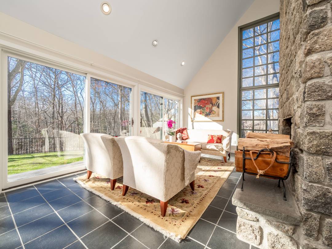 Stunning Contemporary Retreat Abutting Devil's Den Preserve Nestled in nature, this impeccably maintained contemporary home offers peaceful living with unmatched access to hiking, birdwatching, and year round outdoor exploration.