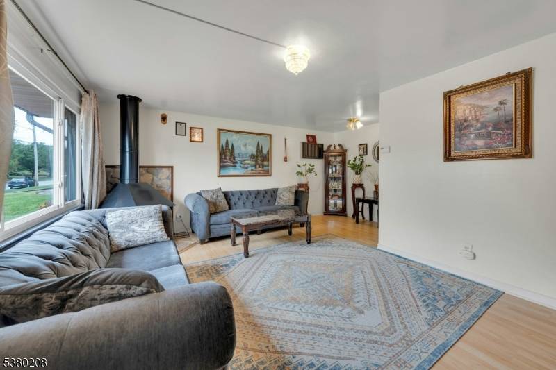 Welcome to this charming 6 bedroom, 2 bath colonial located on a peaceful, residential street just a short walk to NY transportation and Memorial field.