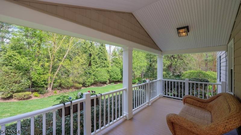 Enchanting five bedroom, three full bathroom custom home tucked away on a private 0.