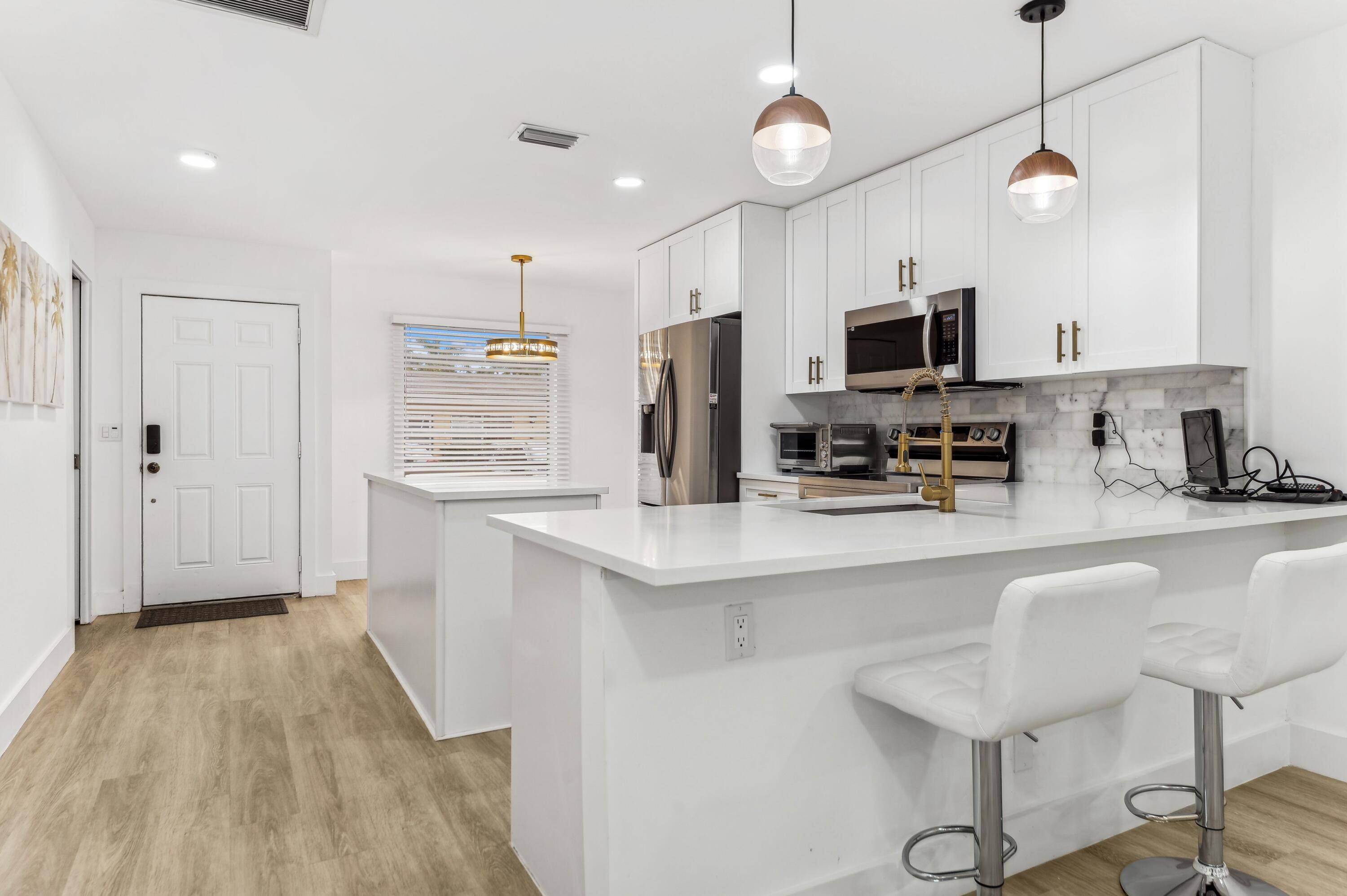 Contemporary and beautifully renovated, this well located and spacious 2 bedroom and 2 bath at Palm Greens is a must see !