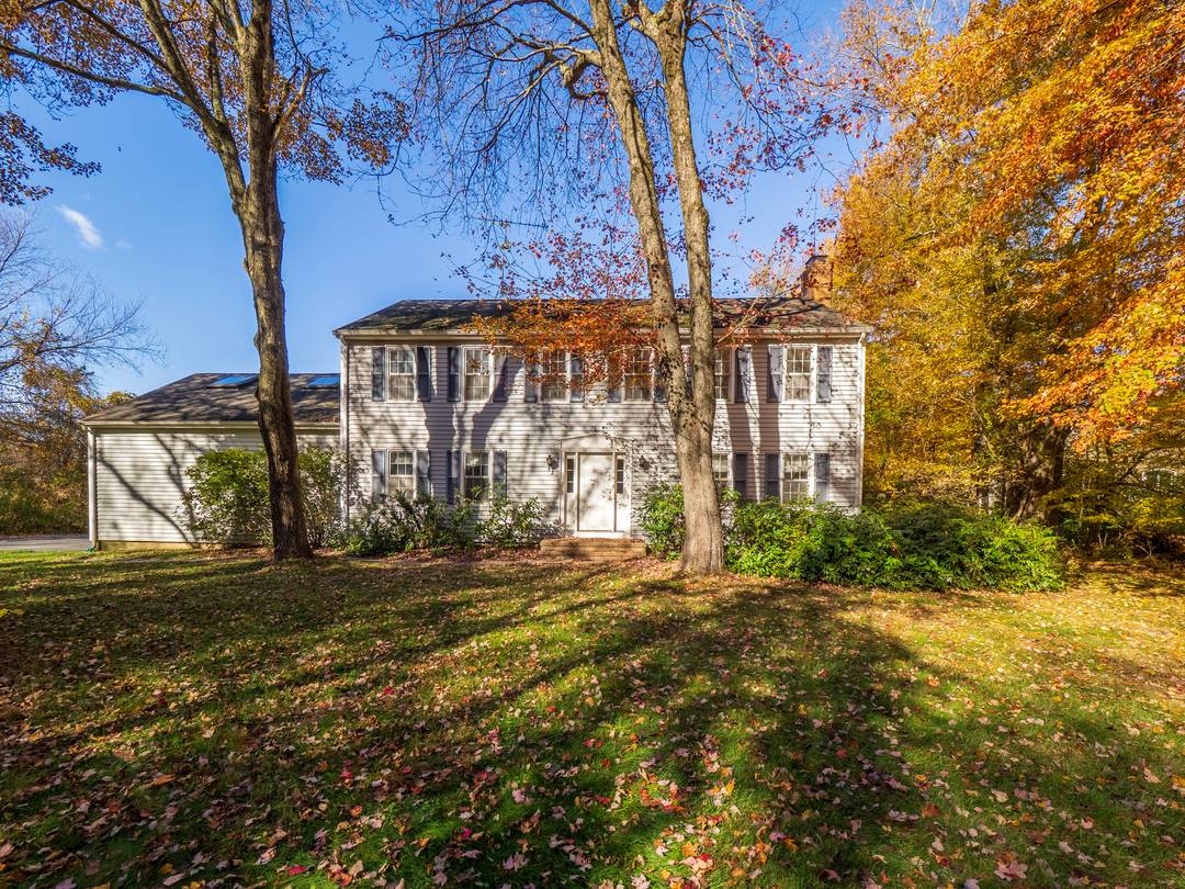 Nestled on a quiet cul de sac, this beautiful home is sited on 2.