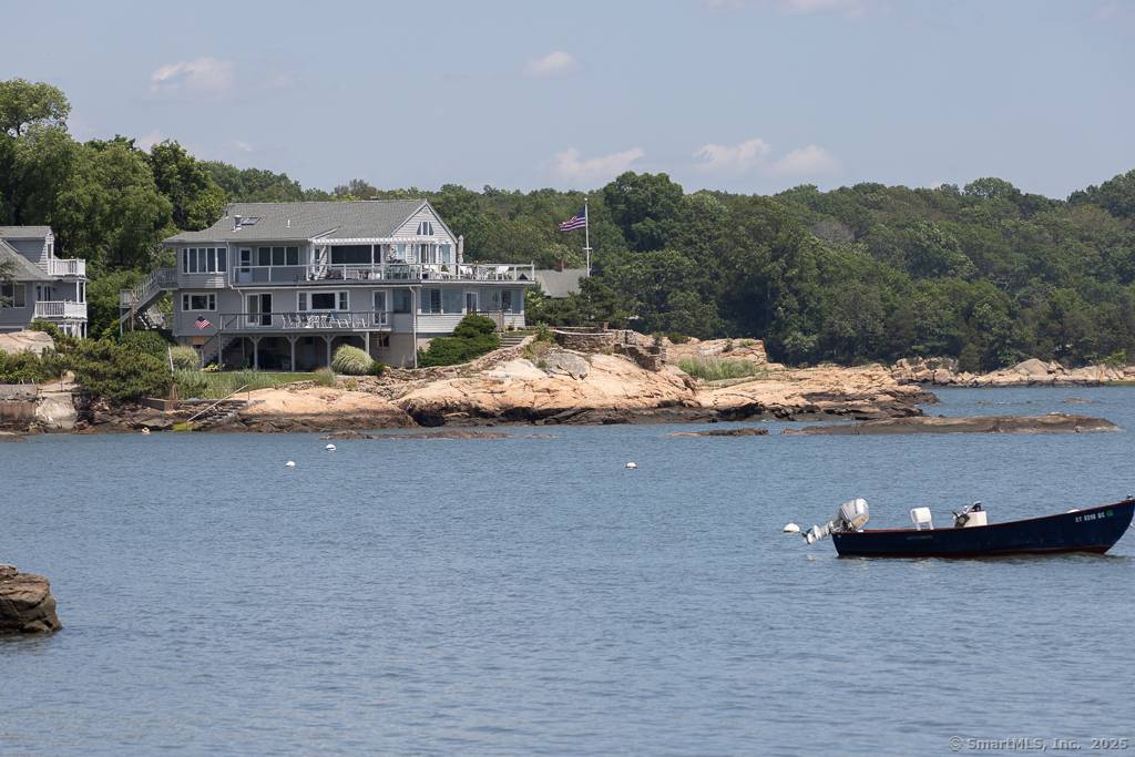 A rare offering in Connecticut's shoreline market, located in the coveted and highly sought after Short Beach enclave, this luxurious direct waterfront condo redefines coastal living.