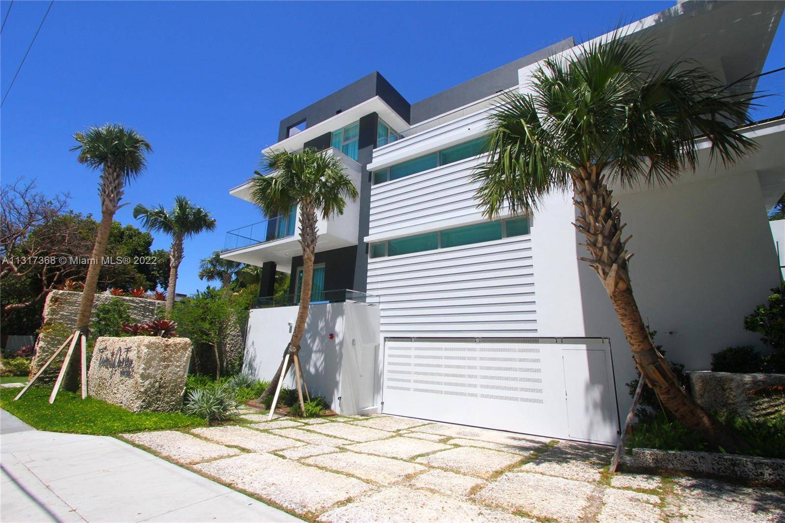 Welcome to this stunning three story townhouse located on Brickell Avenue, one of Miami's most coveted neighborhoods.