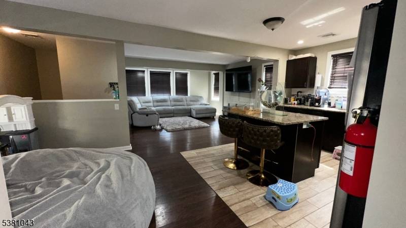 Welcome to 93 Howard Street, a stunning fully renovated 2022 multifamily gem in the heart of Irvington.