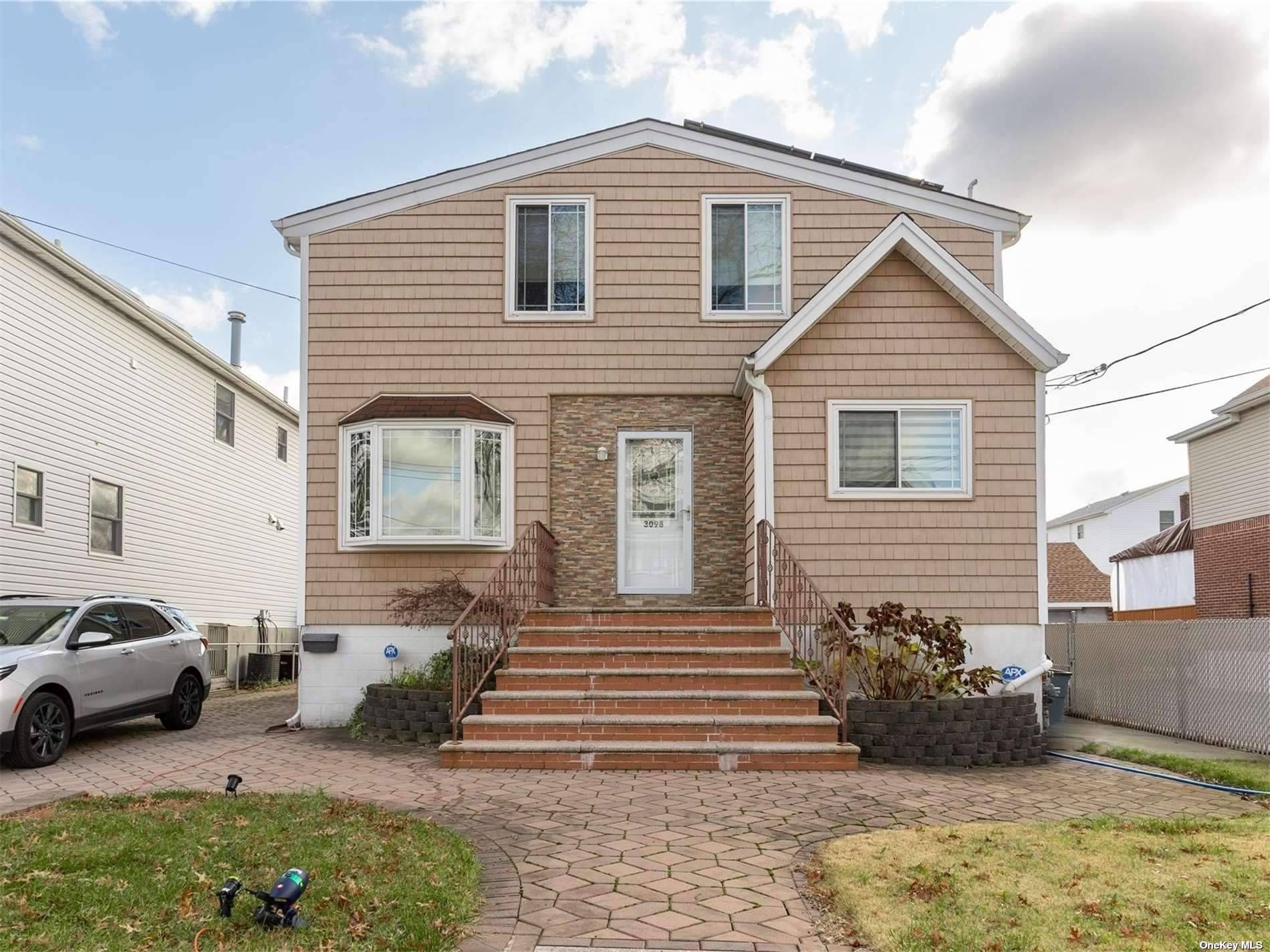 Beautifully maintained Throgs Neck home with amazing water views and modern amenities.