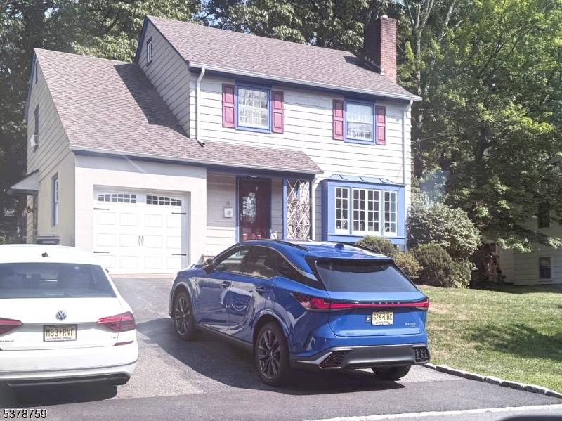 Colonial home located in the St Cloud section, features includes updated kitchen, bathrooms and enclosed porch.