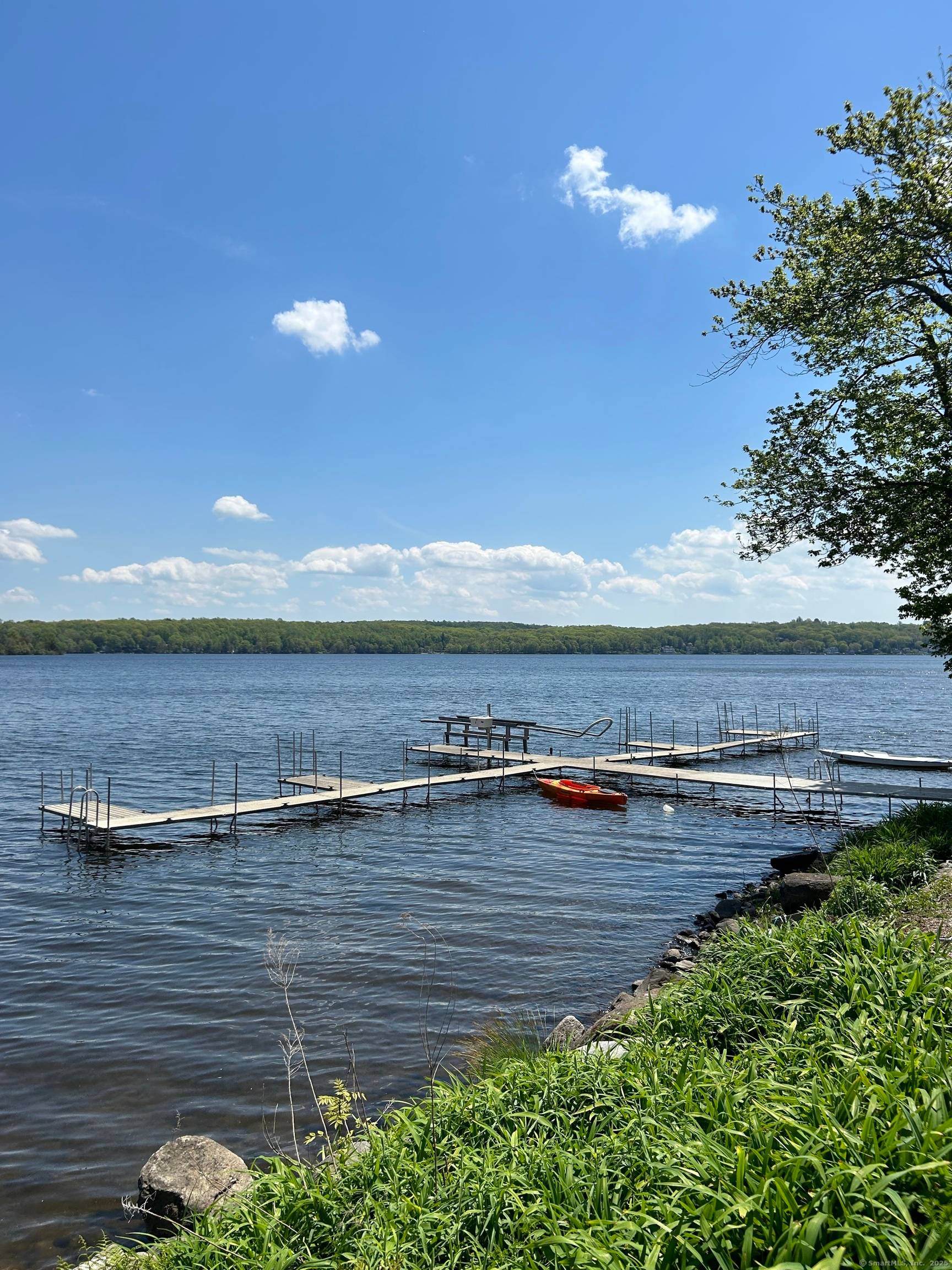 Spend your summer and fall at Bantam Lake as part of a private waterfront community with picturesque grounds, beach, swim platform, tennis court and basketball court.