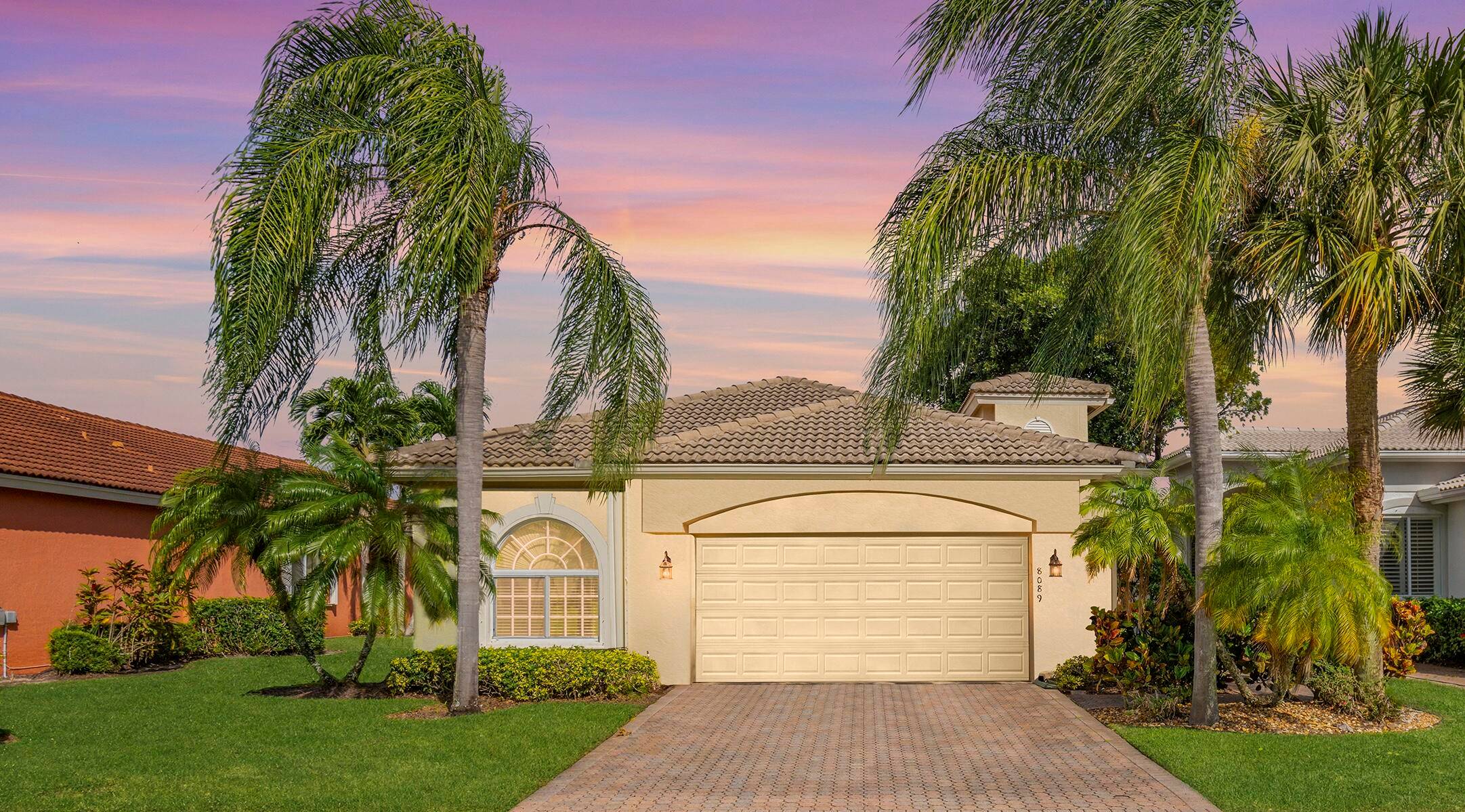 TURN KEY Lakefront Home located in exclusive 55 Venetian Isles.
