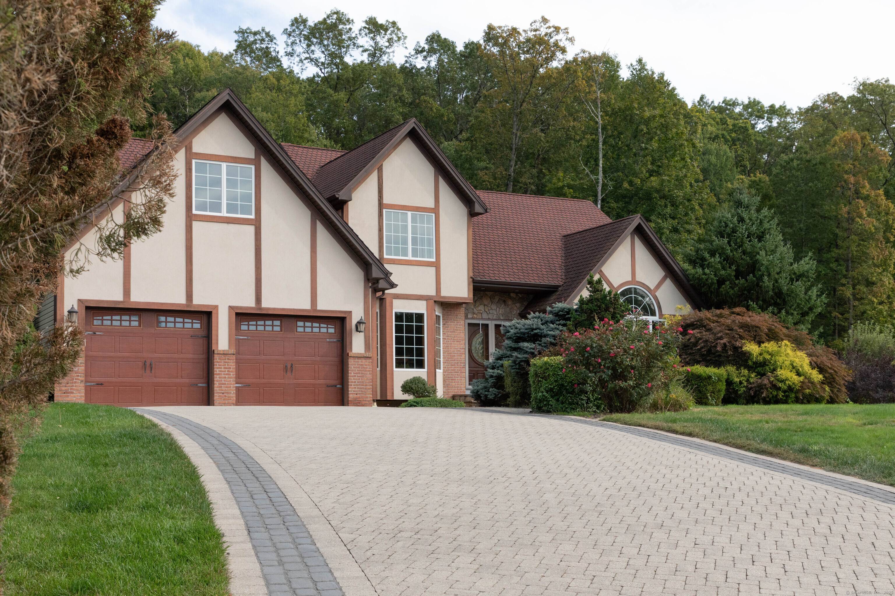 Welcome home to this beautiful custom owner built 2007 Colonial home nestled on just under an acre of lush land backed by mature trees and meticulously maintained landscaping that curls ...
