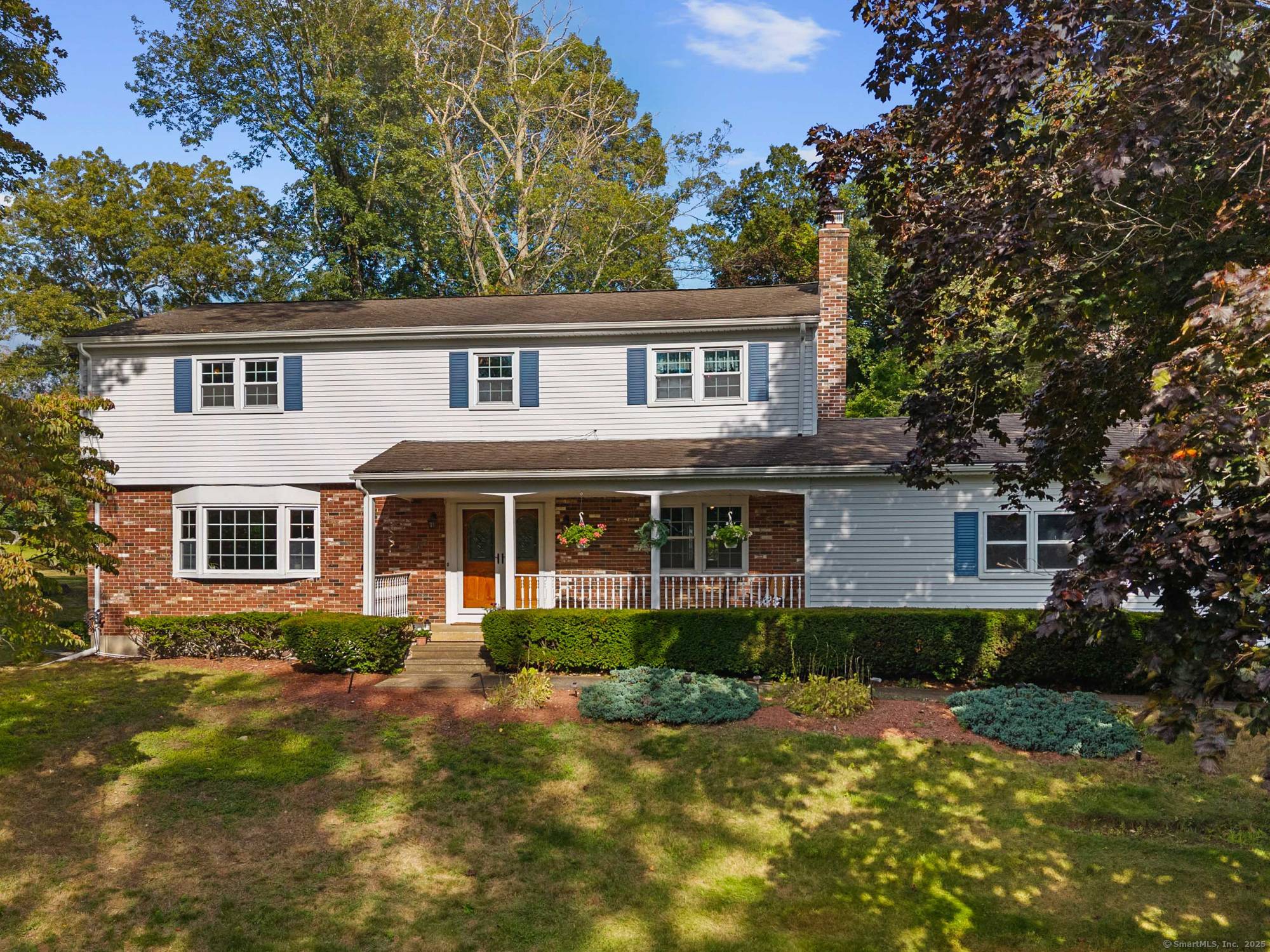 Introducing 2 Brookfield Drive, an impressive 4 bedroom, 3 bathroom colonial on a nearly acre corner lot in East Lyme.