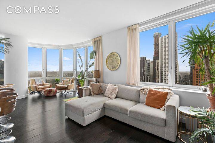 Welcome to this modern two bedroom, two full bath corner unit.