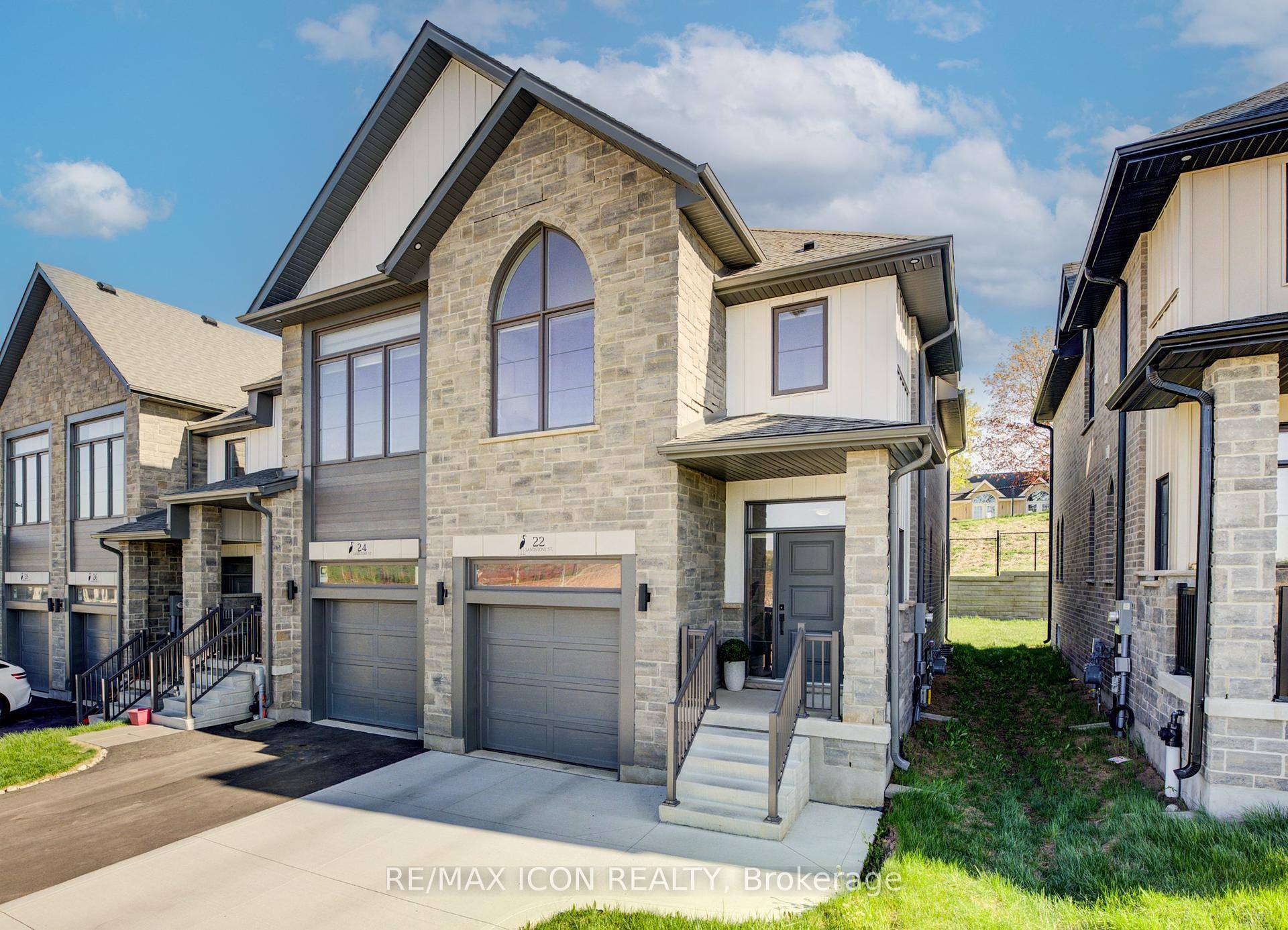 Introducing 22 Sandstone Street, a stunning end unit freehold townhome located in the sought after Westwood Village community in Cambridge.