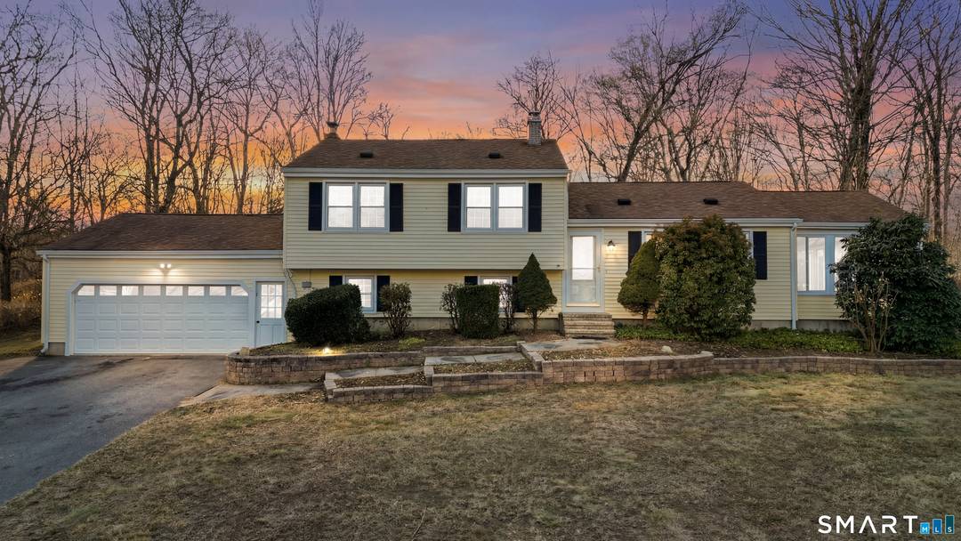 Welcome to 7 Coach Light Dr, a beautifully updated 3 bedroom, 2.