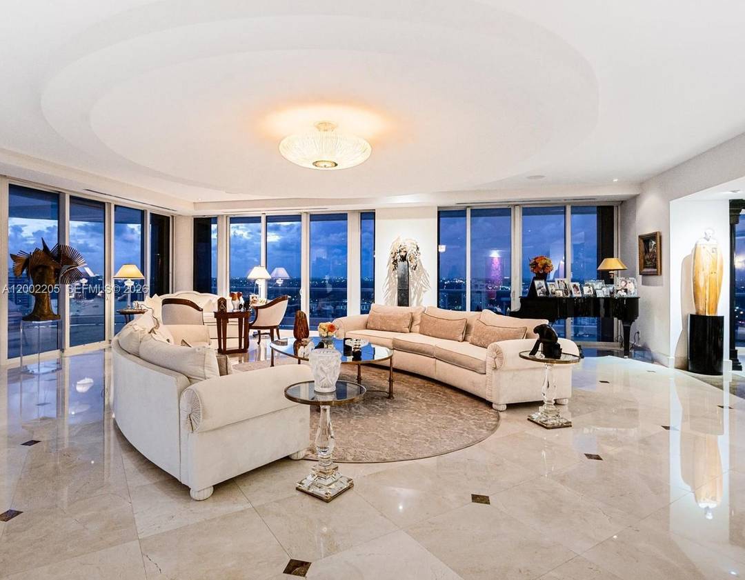 Perched atop Williams Island, this extraordinary double penthouse at 7000 Island Blvd is a true architectural statement, reserved for the most discerning buyer and offered at a remarkable value.