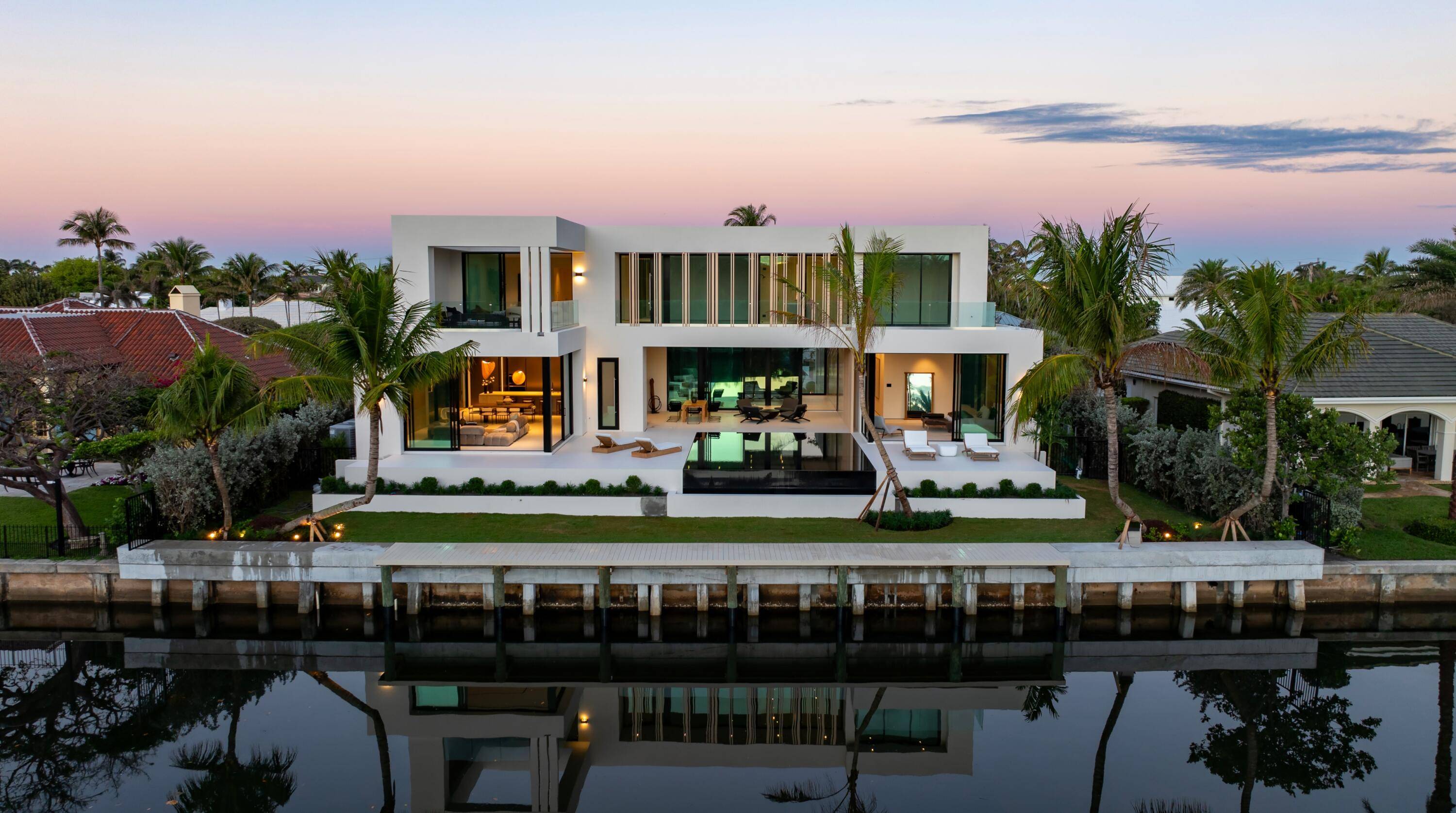 Pairing warm, contemporary styling with organic, ultra luxurious finishes, this unique five bedroom custom masterpiece, executed by Ocean Blue Custom Homes, is museum like and super clean, a simple geometry ...