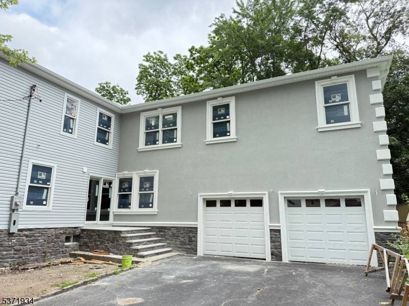 Blocks from Lake Parsippany, this stunning under construction colonial offers 4, 460 square feet of thoughtfully designed living space and will be ready for delivery in late summer early fall.