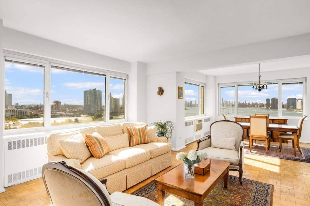 Views, Space, Flexibility, and Dazzling Light Walls of glass frame panoramic skyline and East River views in this luminous corner four bedroom co op.