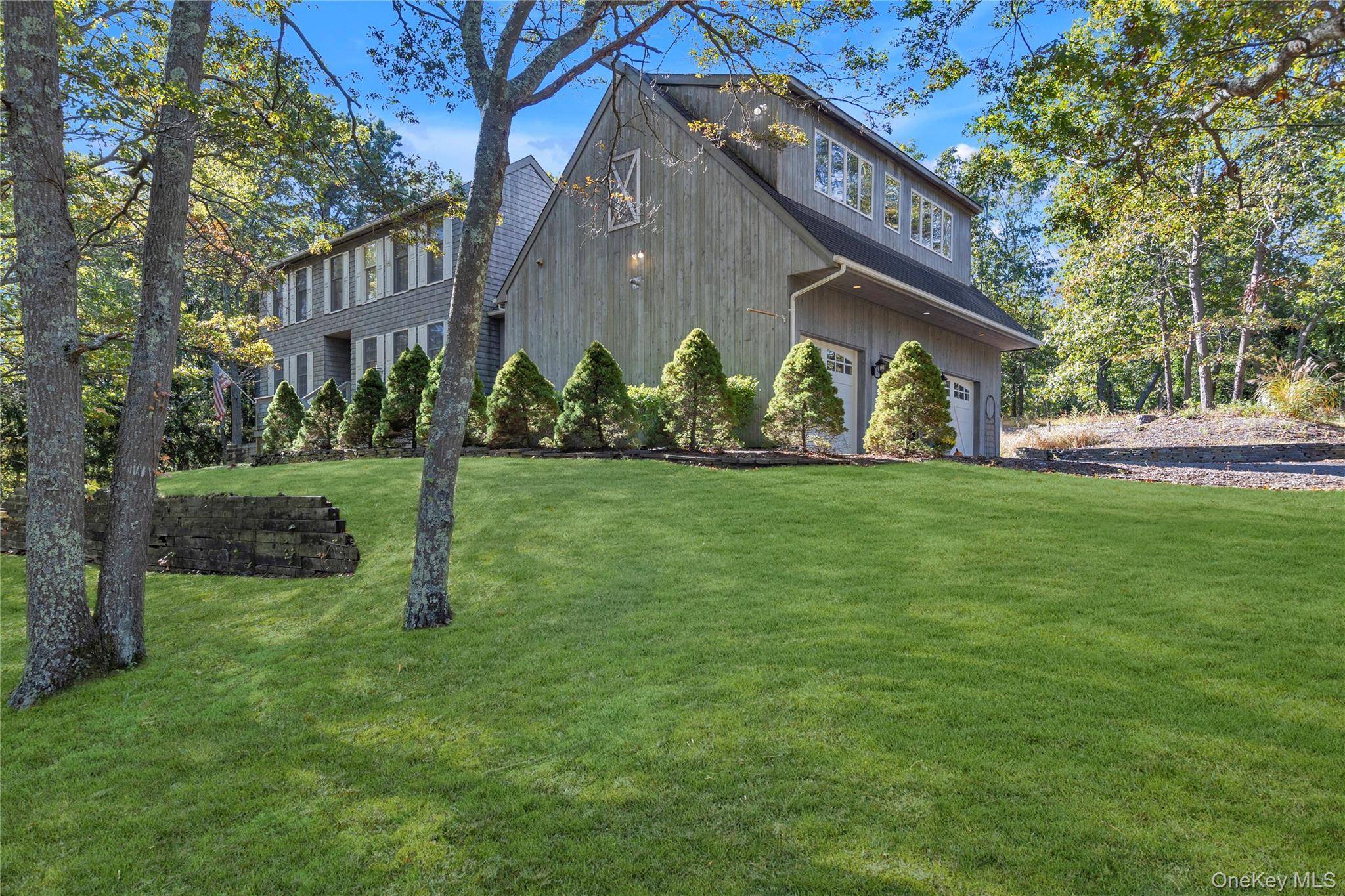Located in the very sought after School District, Eastport South Manor and set on the corner of a private court and just shy of an acre, this 3 Bedroom, 3 ...
