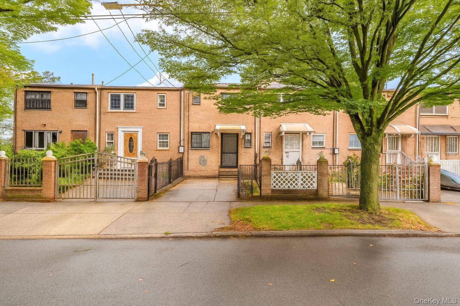 Welcome to this beautifully maintained single family home nestled on a peaceful, tree lined block in the heart of Brownsville.
