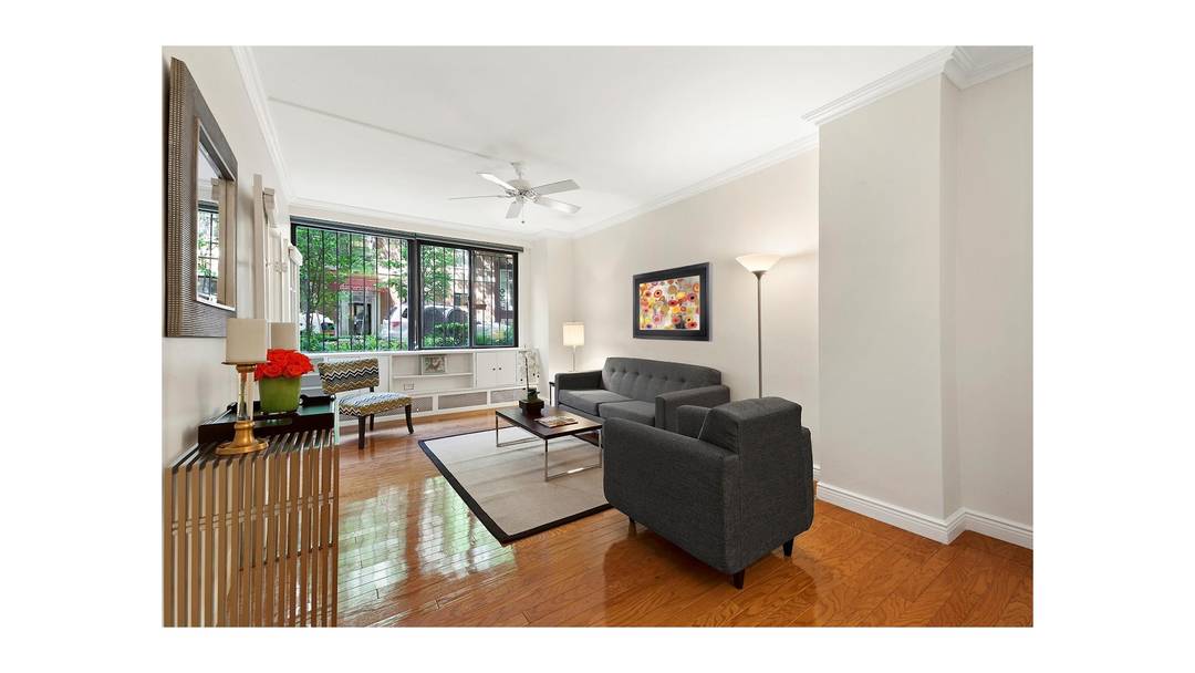 Renovated top to bottom, this lofty and spacious alcove studio junior 1 bedroom has 9' ceilings with lovely views of historic West 16th street and meticulous building landscaping.