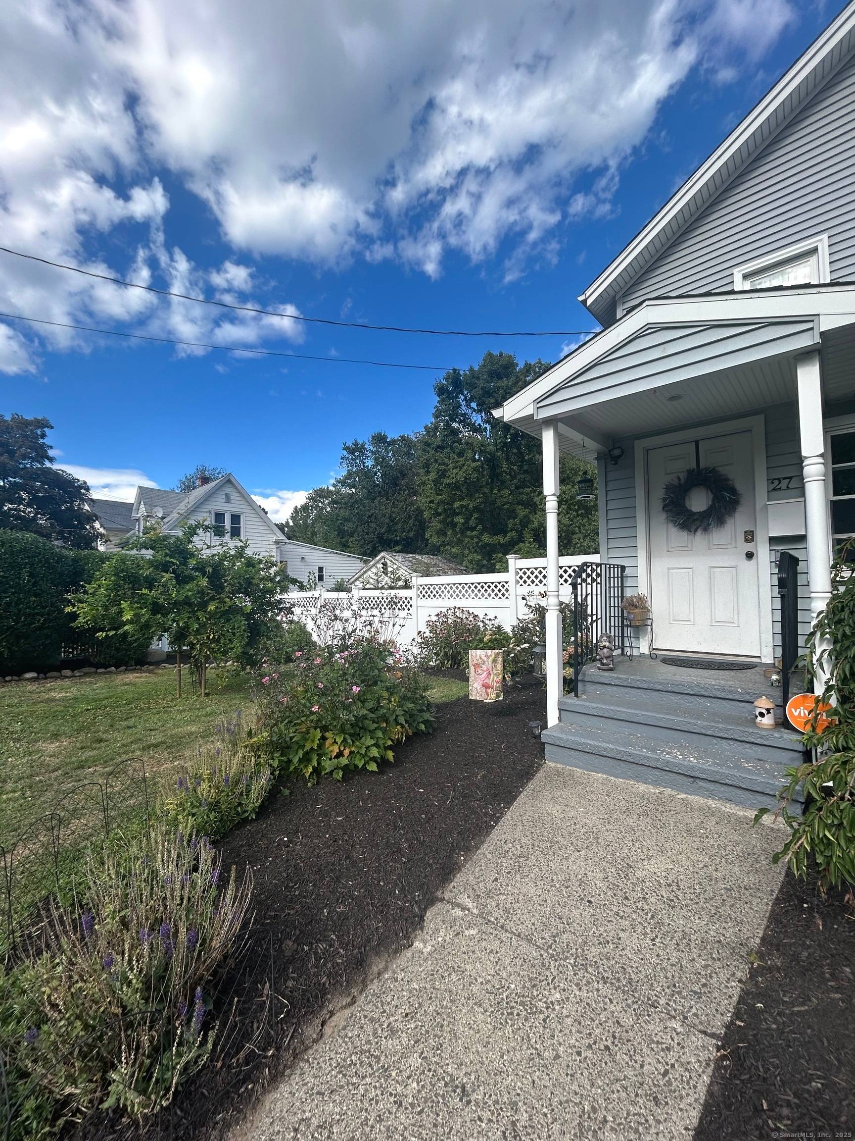 Welcome to 27 Peck Street with a charming front entry finished porch to enjoy reading or that morning cup of coffee.