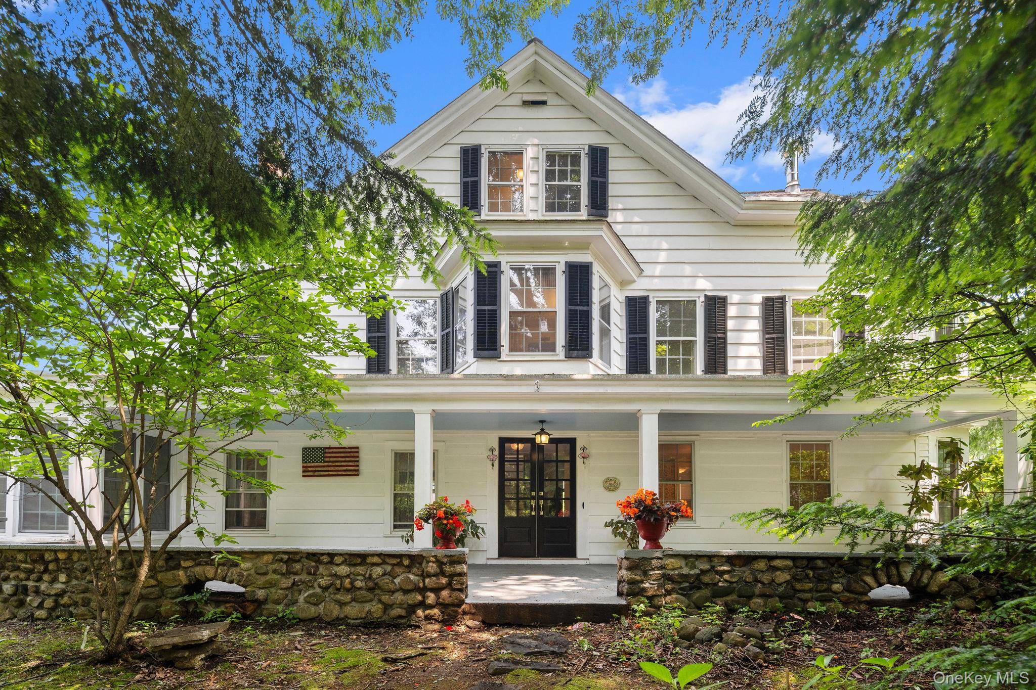 Set in the desirable Village of Pleasantville, this enchanting Colonial home, built in 1830 and sited on.