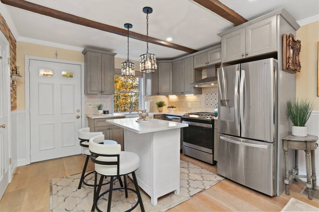 Discover this impeccably remodeled townhouse, where every detail has been curated with a designer's eye.