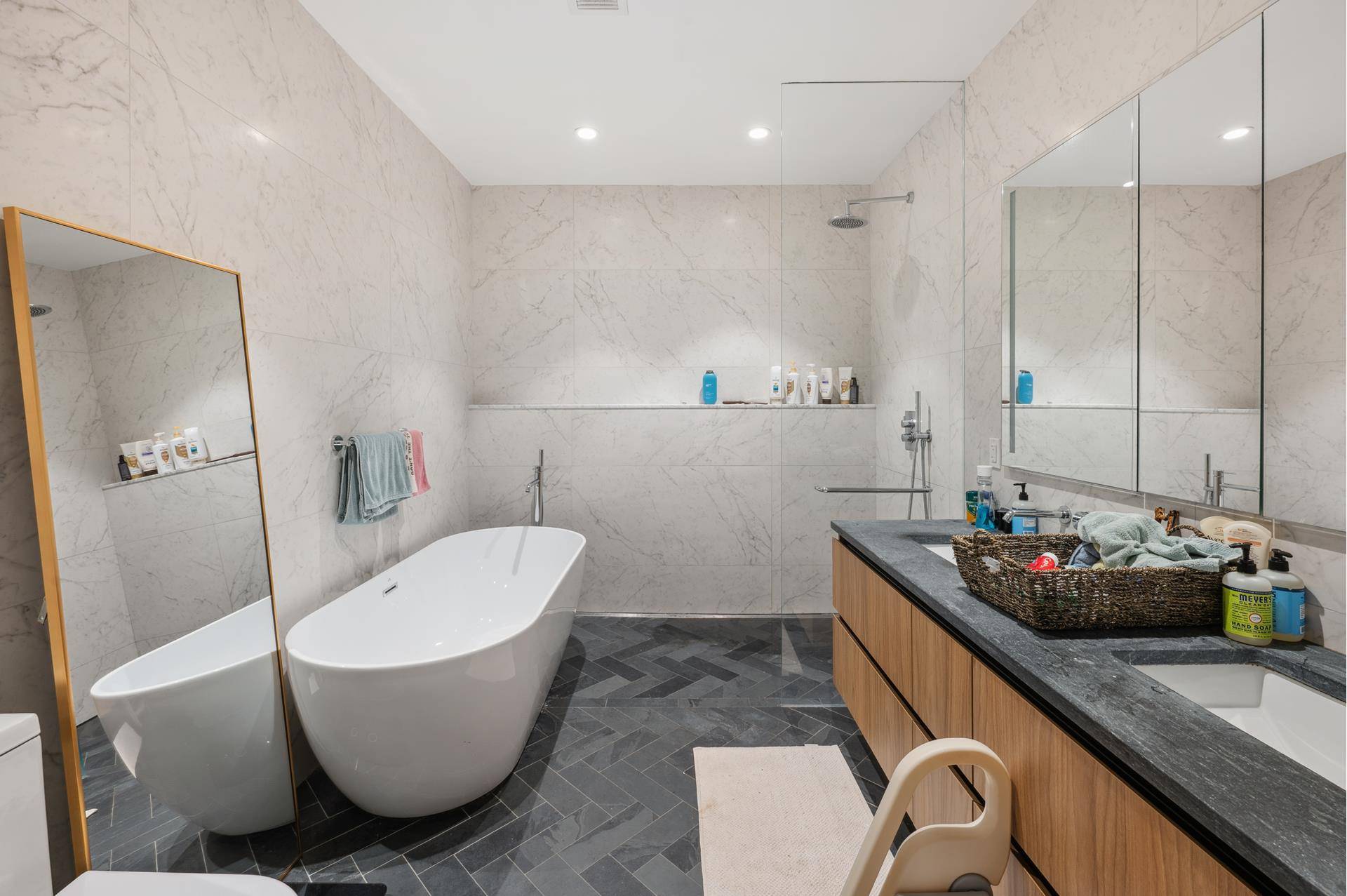 Spacious two bedroom, two bath w 108 sf balcony, oversized windows, 6 wide European white oak flooring throughout, high efficiency central heating and cooling, and a Bosch washer and dryer.