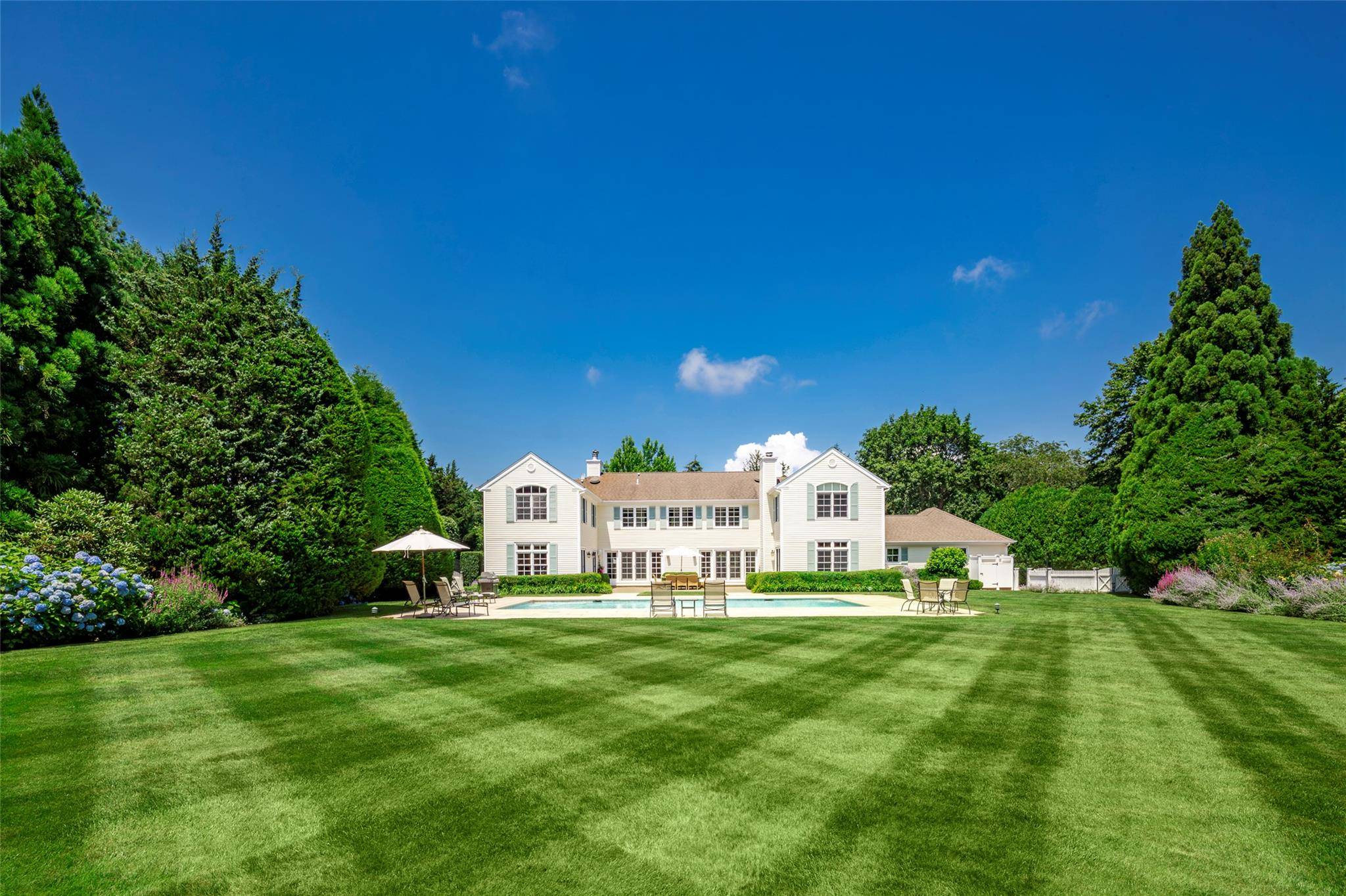 Bridgehampton Village Quiet Elegance on Estate Like Grounds Bridgehampton Village Quiet Elegance on Estate Like Grounds Hidden behind tall hedges in one of the Hamptons' most coveted locations, this elegant ...