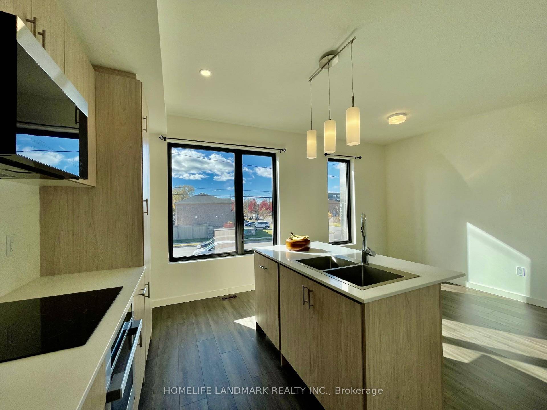 Step into this beautifully less than one year old freehold townhome offering the perfect blend of style, comfort, and convenience.
