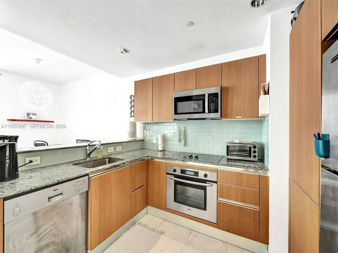 Fully furnished, spacious studio loft located in the heart of Brickell, offering stunning city and partial water views.