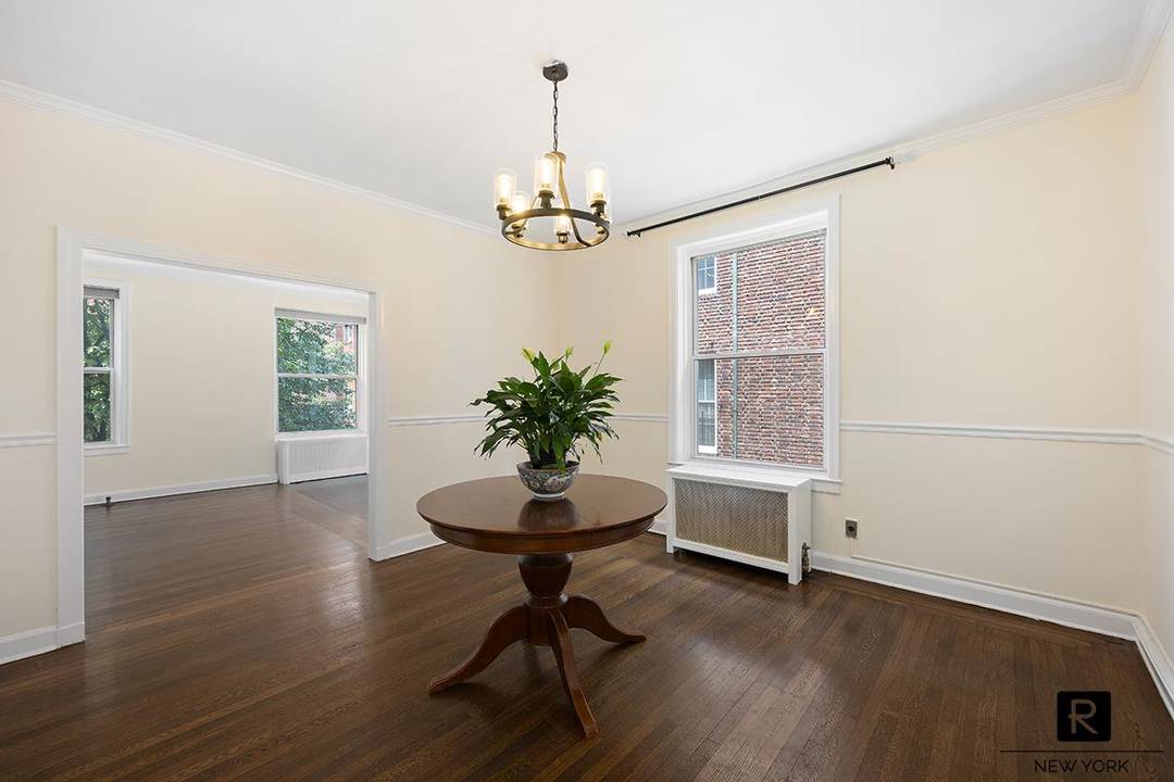 THE QUINTESSENTIAL JACKSON HEIGHTS 6 ROOM GARDEN APARTMENTThis rarely available prewar residence features 3 bedrooms and a formal dining room in addition to a spacious living room, a windowed beautifully ...