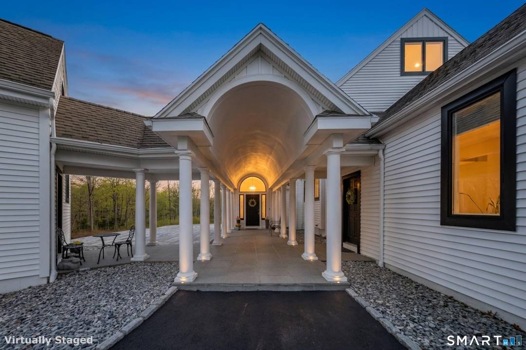 Exceptionally located less than a tenth of a mile from both the town green and beaches with your own private beach access this stunning residence sits on 1.