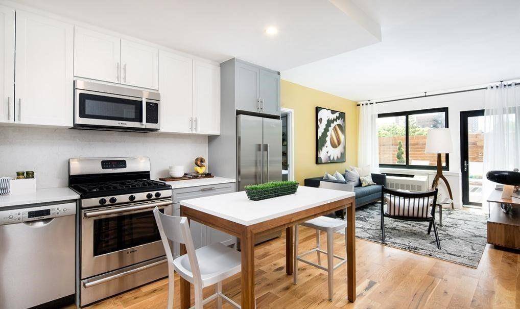 Apartment 5A is a spacious two bedroom, 2 bathroom home with large windows filling the space with beautiful natural light.