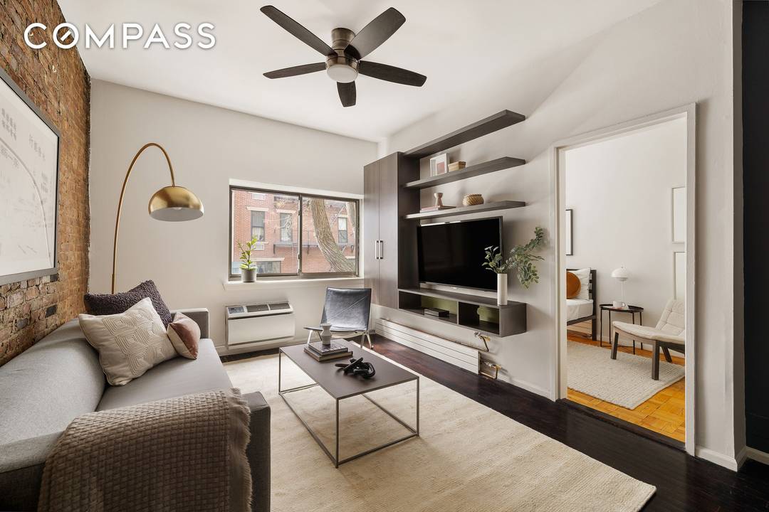 Welcome to Residence 2A at 207 East 21st Street, a thoughtfully renovated one bedroom that blends classic New York character with modern design.