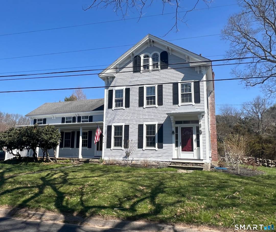 Step into the timeless charm of this beautifully maintained 1874 antique farmhouse, where historic character meets thoughtful modern updates.