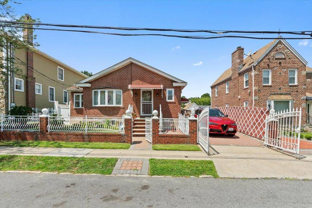Charming brick home in Yonkers with 3 bedrooms, finished basement, and private driveway.
