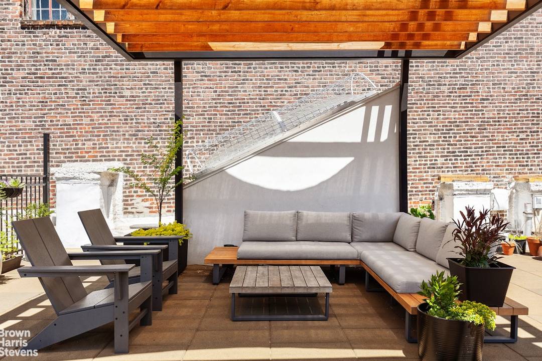 Authentic Full Floor SoHo Artist Loft with Private Storage and Roof Terrace Access Perched on the top floor of a classic SoHo cooperative, Residence 5N at 431 West Broadway is ...